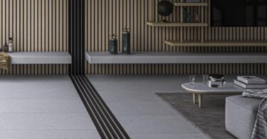 Stone and concrete effect tiles transforming home spaces with texture and style