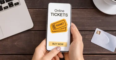 Someone buying tickets on their phone